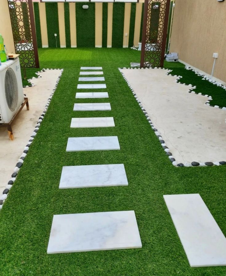 تركيب العشب الصناعي